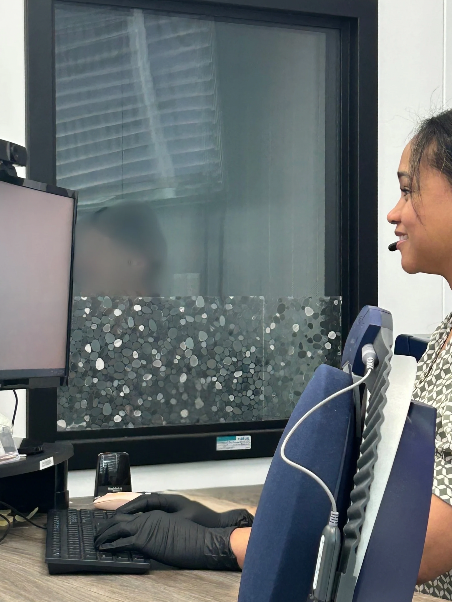 Patient completing a comprehensive hearing test at Creekside Hearing